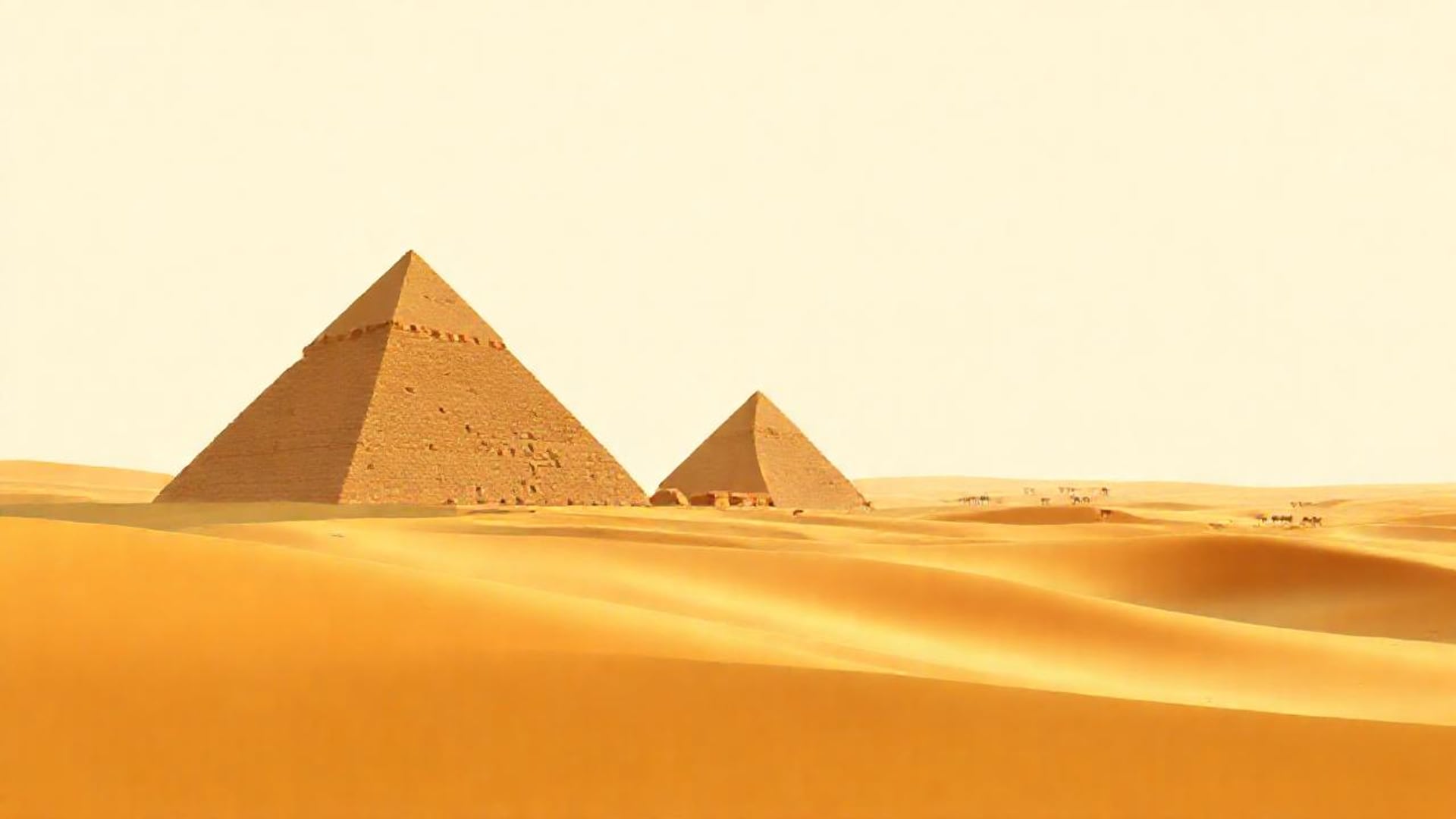 Illustration of two sandstone pyramids rising from golden desert dunes with tiny camels in the distance