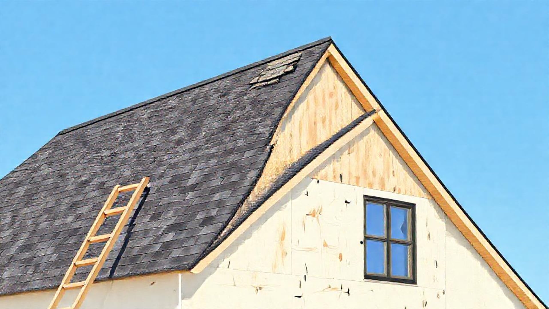 Illustration of a pitched roof half covered in grey shingles and half in plywood, with a ladder at the eave